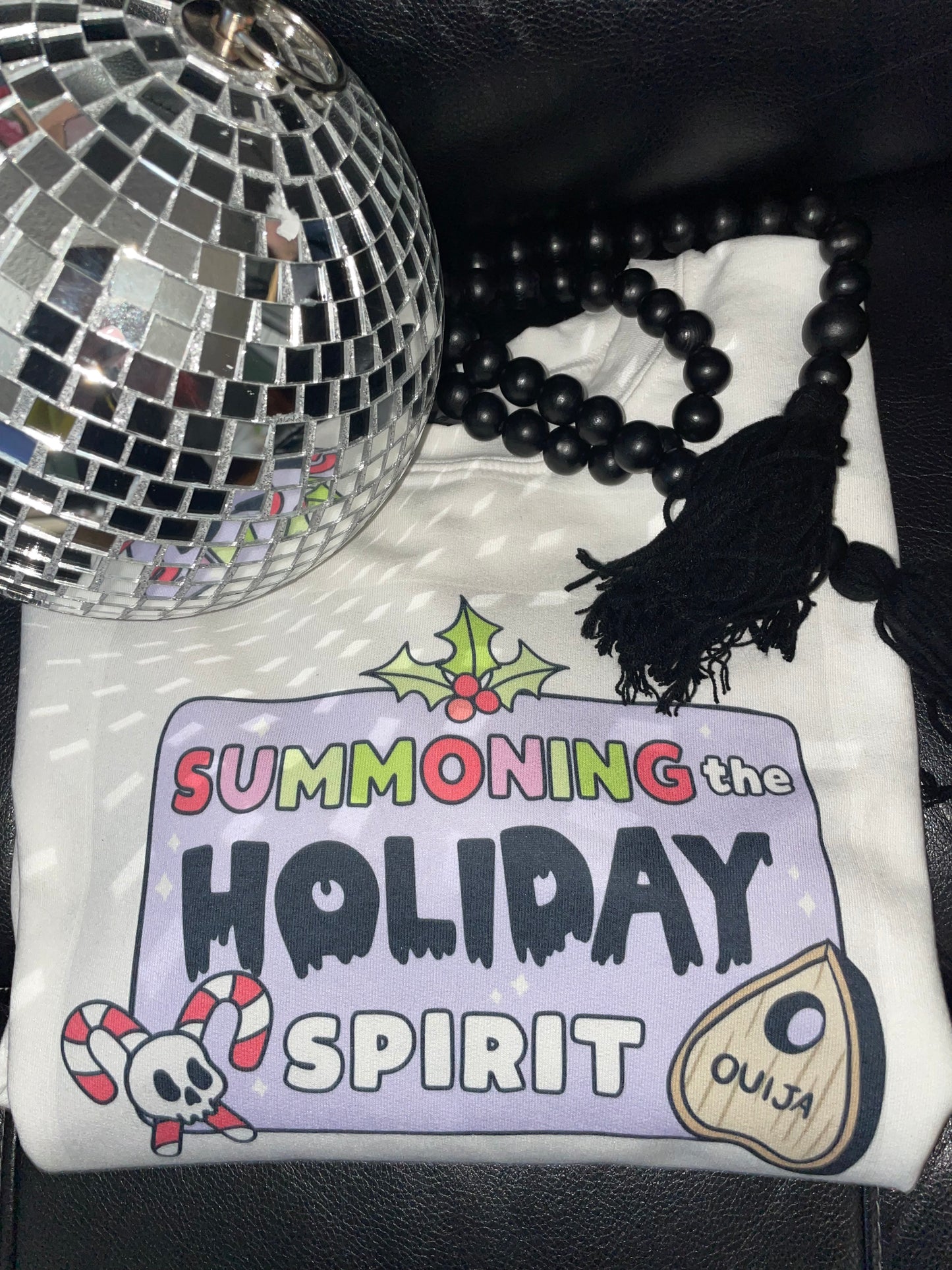 summoning the holiday spirit π sweatshirt