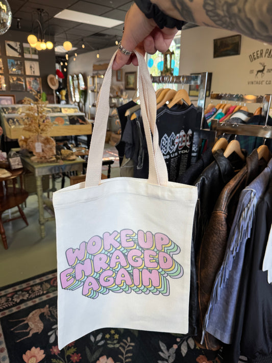 woke up enraged again tote bag